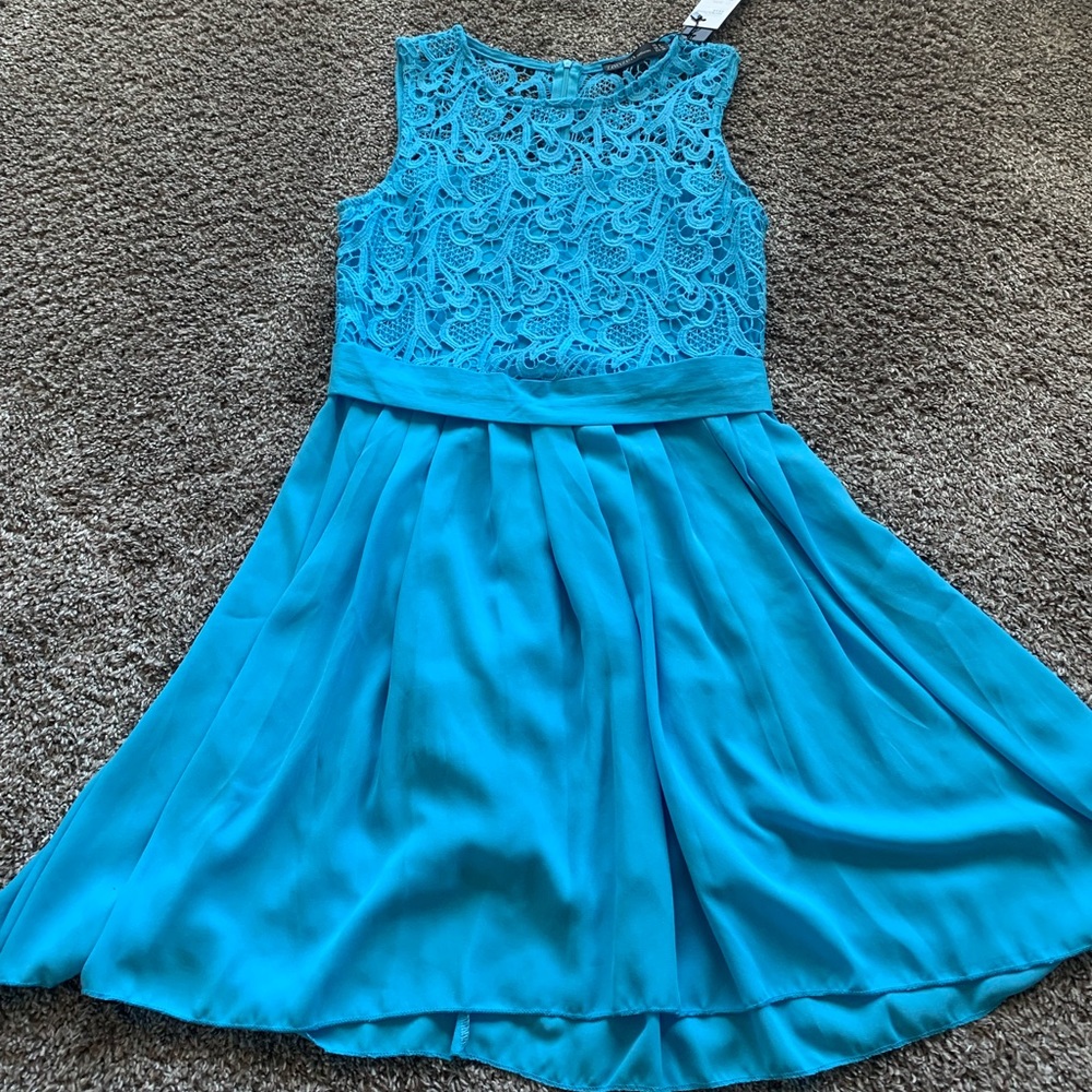 Blue party dress , never worn.